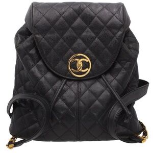 CHANEL Quilted Black Backpack with Gold Accents